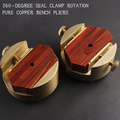 there are two pieces of wood on top of each other with the words, 30 degree seal clamp rotary pure copper bench pliers