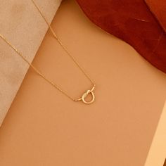 Jenna Elevate your everyday style with the enduring sentiment of the Minimalist Design Promise Knot Pendant Necklace. This necklace features a dainty, intricate knot pendant crafted from solid 14k gold (available in yellow, white, or rose gold). The classic knot design is a timeless symbol of love, commitment, or everlasting connection. Made from 14k solid gold, this necklace offers enduring beauty and a touch of luxury. - Handmade- Solid Gold- Size of the Knot: 7 x 15 mm All pieces come beautif Necklace Simple, Minimalist Rose Gold Pendant Chain Necklace, Minimalist Pendant, Minimalist Tarnish-resistant Pendant Necklace, Minimalist 14k Gold Solitaire Pendant Necklace, Gold-tone Minimalist Necklace With Round Pendant, Minimalist Rose Gold Necklace, Gift For Her, Minimal Pendant, Promise Necklace