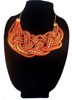 "ORANGE BIB NECKLACE BACK BY POPULAR DEMAND \" THE Nautical bib Necklace\" This time I created it in Orange and gold A great addition to your holiday wardrobe. Make a statement this fall, wear it with your dresses or with a sweater!! Work this piece with almost anything.  Made on a Gold Chain. Length of Necklace is 20 inches and 2 inch extension have been added for length adjustment . A very Elegant piece.  The Necklace has a lobster clasp for ease of wear and removal.  A beautiful Gift for some Luxury Orange Necklaces For Women, Luxury Orange Necklace For Women, Cheap Statement Orange Necklace, Cheap Orange Statement Necklace, Luxury Adjustable Orange Necklace, Luxury Orange Bohemian Necklace, Luxury Bohemian Orange Necklace, Luxury Adjustable Orange Necklaces, Luxury Unique Orange Beaded Necklaces