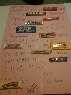 a pink paper with candy bars on it and someone's handwritten note to him