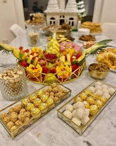 a table filled with lots of different types of food