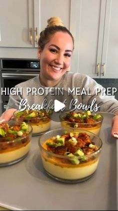 a woman sitting at a table with four bowls of food in front of her and the words high protein meal prep