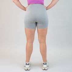 Experience unmatched comfort and style with our Biker Short 6" - No Front Seam. Embrace a seamless front design for maximum comfort and a flattering fit, and take on all of your adventures with unbeatable coverage and coziness. Imagine a comfy morning wrapped up in a cozy cloud! Heather Light Gray was made so you can feel both chic and powerful. Pair it with a matching Racerback Crop, or any color in your closet. Single lined with lined gusset No front seam 6" inseam Flat, 4.25" wide waistband H Sweat Resistant Athletic Shorts For Sports With Medium Support, Medium Support Sweat Resistant Athletic Shorts For Sports, Casual Sweat Resistant Activewear Shorts, Sweat Resistant Running Bottoms With Medium Support, Fitted Gray Athletic Shorts For Gym, Gray Stretch Biker Shorts For Sports, Gray Athleisure Biker Shorts For Training, Short Sportswear Activewear For Outdoor Activities, Fitted Biker Shorts With Built-in Padding For Athleisure