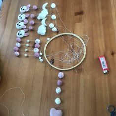 a wooden table topped with lots of different types of toys and decorations on top of it