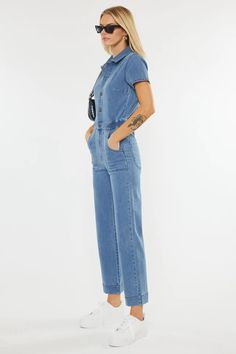 Turn heads everywhere you go in this stylish denim jumpsuit! You are sure to become an instant fashionista with this trendy-chic jumpsuit with a straight-leg fit in a medium wash. Kancan Straight Leg Jumpsuit Elastic Waistband 4 Pocket Design Exposed Button-up Front Rise 11.75" Inseam 26.5" (size M) Color - Medium Wash Blue Denim 77% Cotton 10% Polyester 5% Rayon 6% T-400 2% Spandex Casual Denim Jumpsuit For Workwear, Casual Denim Overall Jumpsuit For Work, Casual Medium Wash Denim Jumpsuit For Work, Casual Denim Blue Jumpsuit For Work, Cotton Straight-leg Medium Wash Jumpsuits And Rompers, Light Wash Overall Jumpsuit For Work, Light Wash Relaxed Fit Jumpsuit For Workwear, Summer Medium Wash Denim Jumpsuit For Work, Summer Denim Jumpsuit In Medium Wash For Work