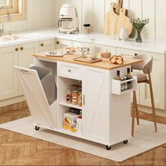 a small kitchen island with an open door on the side and shelves for food storage