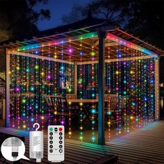 an outdoor gazebo with lights and remote controls