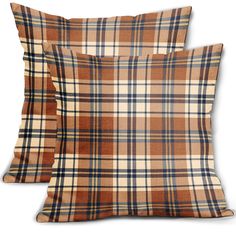 two brown plaid pillows sitting next to each other