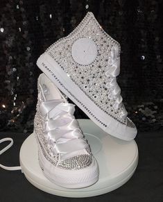 White low top Converse with bling toe and back and a beautiful bling and pearl shoe. All Converse shoes are 100% authentic from Converse or authorized retail sellers. Shoes are not returnable once they are customized. So please make sure you order the correct size.  * Shoes can be made with different color crystals and different size if requested. * Allow 3 to 4 weeks for shoes to be shipped after purchase date. (Processing time depends on work load, contact seller for a specific ship date.) * N Plain White Shoes, Bedazzled Converse, Sparkle Converse, Sparkly Converse, Bride Converse, Rhinestone Converse, Bedazzled Shoes Diy, Quinceanera Shoes, White Low Top Converse