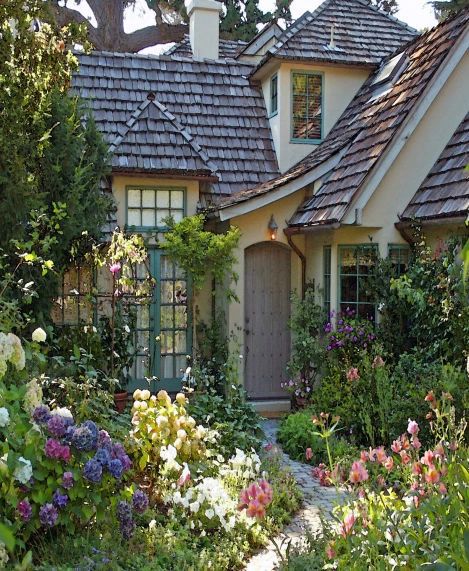 Fairy Tale House Exterior, 1920s Tudor Home, Cottage Home Front Yard, Wacky House Exterior, 70s Victorian House, Cottage And Garden, Cottage Home Aesthetic Exterior, Cozy Cottage Exterior Fairy Tales, Small Cute Garden