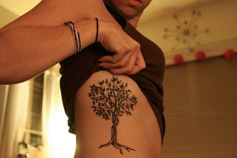 Revelations 2:7  "He who overcomes has the right to eat from the tree of life, which is in the paradise of God." Olivia Tattoo, Olive Tree Tattoo, Tree Tattoo Side, Olive Tree Tattoos, Tree Tattoo Men, Willow Tree Tattoos, Bible Verse Tattoos, Verse Tattoos, Family Tree Tattoo