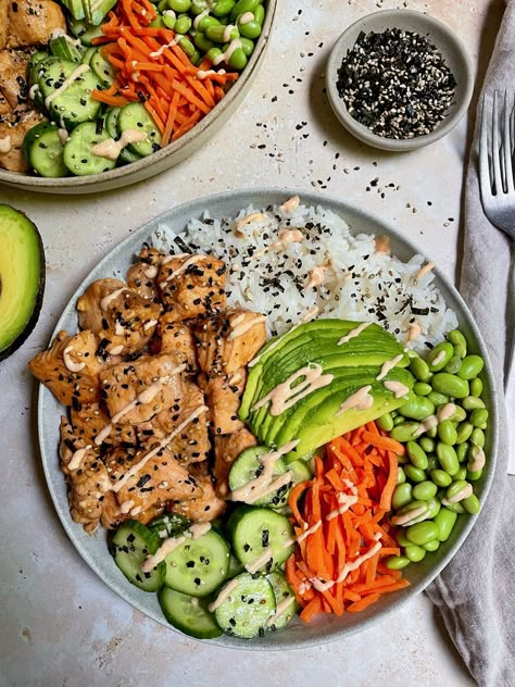 Asian Salmon Rice Bowls Salmon Buddha Bowl, Cubed Salmon, Long Grain White Rice, Soy Sauce Rice, Asian Salmon, Salmon Marinade, Salmon Rice Bowl, Pickled Cucumbers, Salmon Rice