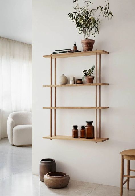 Fogia's minimalist and very versatile 'Bond' oak shelving unit, shown in a minimalist living room in white and neutral earth tones | 21 of the best wall-mounted shelving units | These Four Walls blog Fogia Bond, Apartment Shelf, Diy Shelves Design, Minimalist Shelves Decor, Oak Shelving Unit, Wall Mounted Shelving Unit, Wood Shelving Units, Minimalist Shelves, Wall Display Shelves