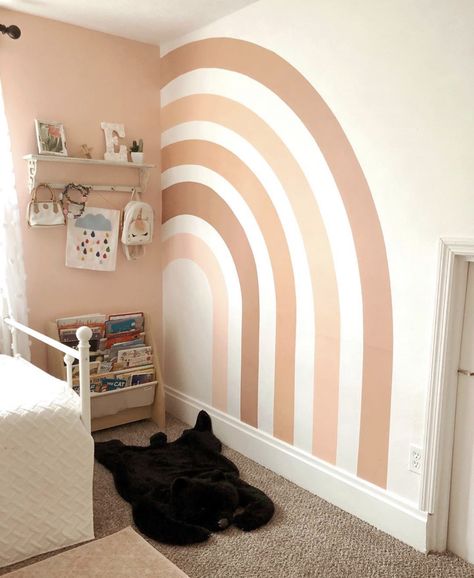 Neutral Rainbow Playroom, Accent Shape On Wall, Toddler Girl Bedroom Wall Ideas, Neutral Rainbow Bedroom, Diy Boho Rainbow Wall Mural, Wall Decor Toddler Girl Room, Rustic Rainbow Nursery, Pastel Rainbow Accent Wall, Boho Nursery Mural