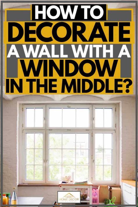 How To Decorate A Wall With A Window In The Middle? Article by HomeDecorBliss.com #HomeDecorBliss #HDB #home #decor Accent Wall Window Living Room, How To Decorate A Wall With A Window, Small Dining Room Ideas With Window, Wall With Window In The Middle, Small Living Room Window Ideas, Above Kitchen Window Decor, Accent Wall Around Window, Large Window Decor, Above Window Decor