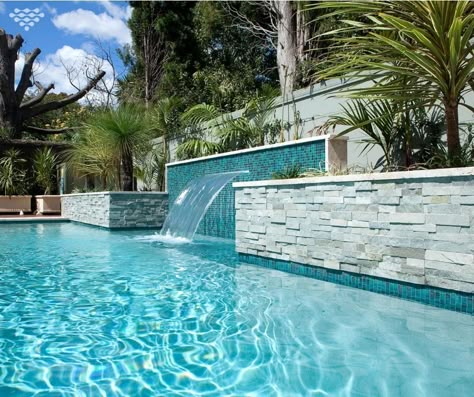 Adding a sheer descent water feature to your pool design not only looks visually stunning, but immediately creates a relaxed atmosphere with the running water sound.  On top of this, lounging on the ledge underneath soon becomes a favourite pasttime for adults and children, alike. Pool Paving, Moderne Pools, Florida Pool, Dream Backyard Pool, Outside Pool, Pools Backyard Inground, Stone Pool, Pool Water Features, Pool Remodel