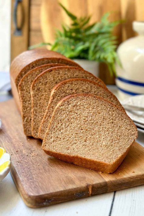 This 100% whole wheat bread recipe is a simple way to make a single loaf of nourishing, delicious, homemade bread. Whether you're a first-time bread maker or a seasoned baker, you will fall in love with this soft and tender sandwich bread recipe. Easy Whole Wheat Bread, Whole Wheat Sandwich Bread Recipe, Homemade Whole Wheat Bread, Whole Wheat Bread Recipe, 100 Whole Wheat Bread, 31 Daily, Recipe For One, Wheat Bread Recipe, Wheat Recipes