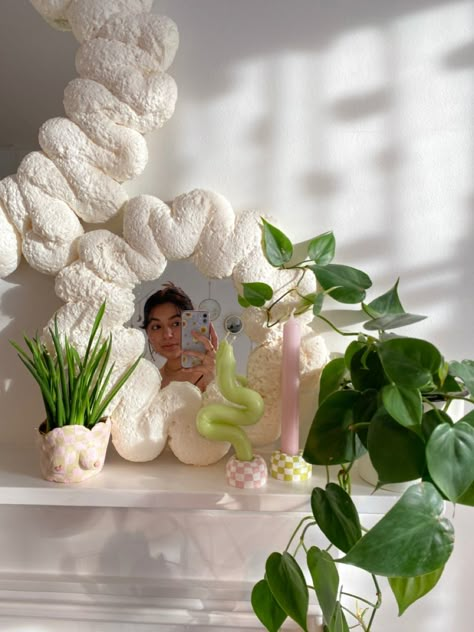 using expanding foam to make flower shaped mirrors and airdry clay to make checkerboard candlestick holders Diy Puffy Mirror, Cute Mirror Decor, Diy Clay Mirror Frame, Foam Clay Mirror, Expanding Foam Mirror, Foam Mirror Frame, Custom Mirrors Diy, Expanding Foam Art, Spray Foam Mirror