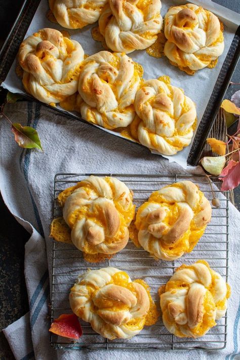 Giant Cheddar Twists are made with a buttery, soft dough filled and twisted with cheese to form a knot that oozes out of each roll.  These large rolls are great served with soup and perfect to dip into a hot bowl of chili. I bet you can't each just one! March Recipes, April Recipes, September Recipes, October Recipes, Gingerbread Hot Chocolate, Harvest Bread, Cabbage Wraps, Chocolate Drop Cookies, Cheese Twists