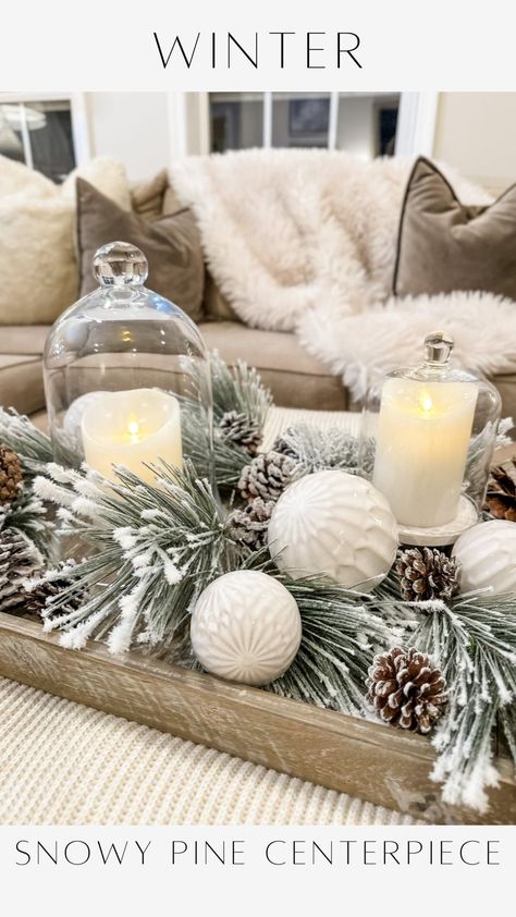 Janine Graff | Snowy Pine Centerpiece ❄️captures the essence of the winter season. I adore the soft glow of candlelight. It’s a challenge to maintain that... | Instagram January Dining Table Centerpieces, Winter Decor Centerpiece, Snowy Centerpiece Ideas, Simple Winter Table Centerpieces, Winter Centerpiece Ideas, Snow Centerpieces, Winter Candle Centerpieces, January Table Centerpieces, Snowman Centerpiece Ideas