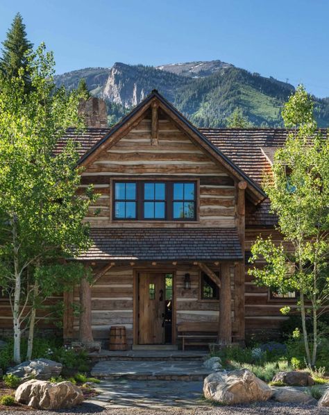 The facade is backed by the spectacular Teton mountains. Rustic Cabin Exterior, Rustic Home Exterior, Cottage House Exterior, Log Cabin Exterior, Rustic Mountain Homes, Rustic Exterior, Colonial Exterior, Cabin Exterior, Modern Mountain Home