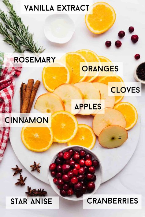 Create a holiday home with this Christmas simmer pot blend. This safe and toxic-free stovetop potpourri will infuse the air with a warming December scent. You can use this Christmas simmer pot every day for several days. - #christmassimmerpot #simmerpot #holidaypotpourri #christmaspotpourri Christmas Pot Simmer Recipe, Scent Pot On Stove Christmas, Drying Fruit For Simmer Pot, Christmas In A Pot, Homemade Christmas Simmering Potpourri, Crockpot Smell Good Home Christmas, Freeze Dried Simmer Pots, Potpourri In Crockpot, Cranberry Orange Simmer Pot