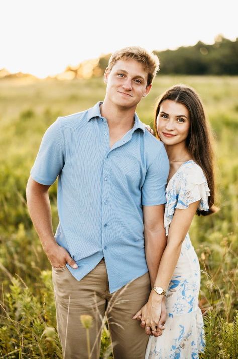 Georgia based wedding and couples photographer captures a beautiful summer engagement photoshoot in an open field filled with wildflowers at sunset. Showing the couple running through the field, picking flowers, and stealing kisses.    #summerengagement #wildflowerfield #georgiaengagementphotographer #engagementphotoideas #engagementoufitideas #coupleposinginspiration Front Facing Couple Poses, Different Couple Poses, Couples Session Poses, Couple Big Height Difference, Cute Engagement Poses, Husband Wife Picture Poses, Corn Maze Couple Pictures, Cute Poses For Pictures Couple, Flattering Poses For Couples