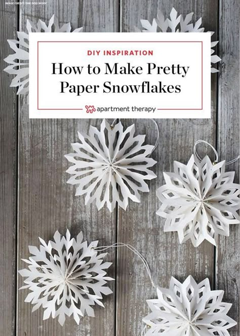 Nine ways to take paper snowflakes to the next level. #diysnowflakes #papersnowflakes #holidaydecorations #holidaydecor #garland  #snowflakepatterns Paper Winter Wonderland, Folded Paper Decorations, Winter Wonderland Work Decorations, Folded Paper Snowflakes, Snowflake Folding Pattern, Winter Wonderland Office Decorations Diy, Snow Decor Diy Winter Wonderland, Paper Winter Decorations, Winter Wonderland Christmas Decorations Diy