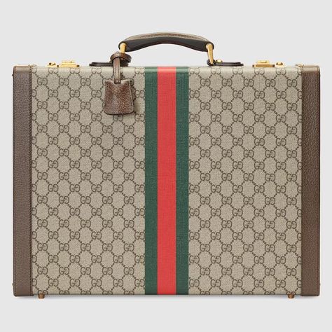 Gucci Savoy suitcase in beige and ebony Supreme | GUCCI® UK Group Gifts, Travel Bags For Women, Lifestyle Travel, Free Logo, Travel Lifestyle, Black Backgrounds, Travel Bags, Trunk, Gift Wrapping