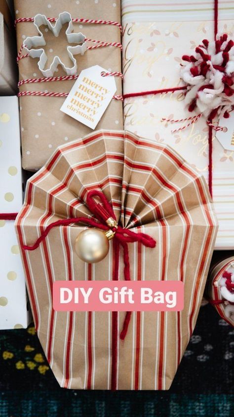 Have you ever tried making a gift bag from wrapping paper? I've done this when I need to wrap something like a stuffed animal, oddly shaped toy, or round item. This accordion fold method for the top is inspired by @beeandblooms! #thediymommy #giftwrappingideas #giftwrap #giftwrapping #christmashack | The DIY Mommy | The DIY Mommy · Original audio Making A Bag With Wrapping Paper, Wrap Two Gifts Together, Make Bags From Wrapping Paper, Make Bag From Wrapping Paper, How To Wrap A Bag Present, How To Prank Wrap A Gift, How To Wrap Bulky Gifts, Fold Gift Bag, Wrapping Paper Into Gift Bag