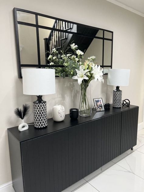 Black Cupboards Living Room, Black And Cream Decor Living Room, Black Buffet Table Decor, Black And Cream Home Decor, Long Sideboards Living Room, Beige And Black Interior Design, Dining Sideboard Decor, Black Sideboard Living Room, Sideboard In Living Room