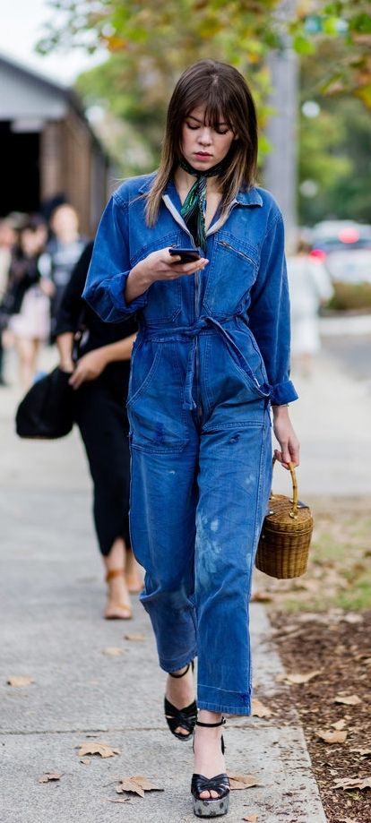 A Functional Jumpsuit Looks Feminine With Peep-Toe Wedges Denim Jumpsuit Street Style, Boiler Suit Outfit, Platform Outfit, Street Style 2016, Suit Outfit, Australia Fashion, Blue Jumpsuit, Boiler Suit, Trendy Swimwear