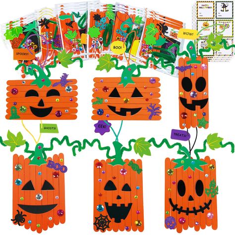 PRICES MAY VARY. 24 Single Pack Craft Stick Pumpkin Ornament Craft Kits: Each kit comes in its own package—just grab one and start the fun! Inside each pack, you'll find everything you need to make a spooky pumpkin: orange popsicle sticks, foam stickers for the pumpkin's stem, leaf, and Jack-O'-Lantern face, 2 Halloween glitter stickers, gem stickers, a twisty green chenille stem, a string for hanging, and a foam tag you can write on. Great for a fun crafting day at school or a Halloween party a Real Pumpkin Crafts, Pumpkin Crafts For Kids, Easy Halloween Crafts For Kids, Fall Kids Crafts, Pumpkin Decorating Diy, Halloween Craft Kits, Popsicle Stick Crafts For Kids, Halloween Pumpkin Crafts, Gem Stickers