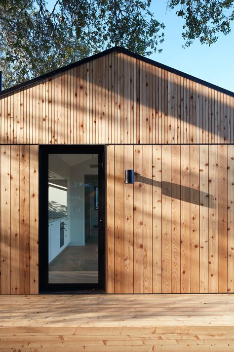 Photo 5 of 6 in Wrapped in Cedar, the Dwell House Showcases the Texture and Beauty of Natural Wood - Dwell Cedar Cladding House, Cedar House Siding, Cedar Siding Exterior, Wood Siding House, Wood Cladding Exterior, Small Modern Cabin, Lake House Furniture, Wood Siding Exterior, Wood Facade