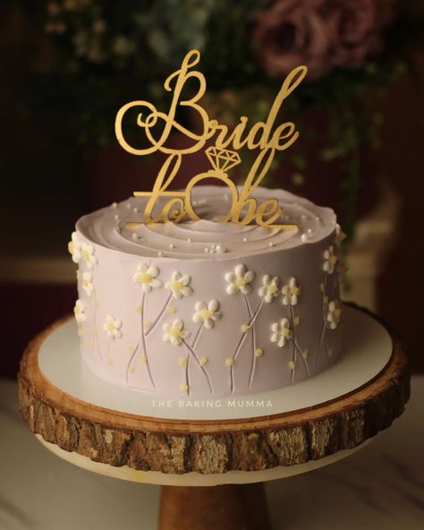 Whimsical lilac with a touch of daisy magic 🌸💜 Celebrating the beautiful bride-to-be with a cake as dreamy as her big day! #Bridetobe #LilacLove #DaisyDreams #WeddingVibes #BakingWithLove Bride Cake Ideas, Bride To Be Cake Design, Hens Cake, Bride To Be Cakes Ideas, Bride To Be Ideas, Bride To Be Decoration Ideas, Miss To Mrs Cake, Whimsical Cakes, Bride To Be Cake