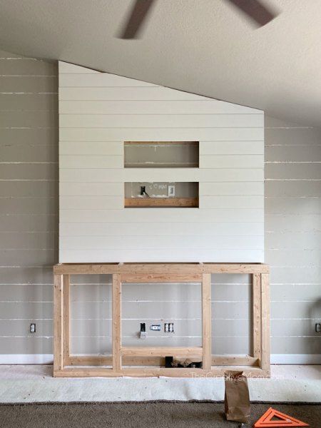 Diy Electric Fireplace Angled Ceiling, 8ft Ceiling Fireplace, Diy Electric Fireplace Wall Slanted Ceiling, Diy Fireplace Tv Wall Angled Ceiling, Angled Ceiling Fireplace, Angled Shiplap Fireplace, Diy Fireplace With Vaulted Ceiling, How To Make A Free Standing Fireplace Look Built In, Diy Fireplace With Mantle