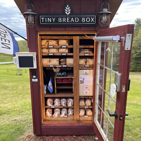 BAKED GOODS in a rural setting in Vernon, Vermont. Tiny Bread Box is a small-batch home bakery offering a variety of freshly baked goods from our automated self-serve farm stand every Saturday. About our Baked Goods Our bread is naturally leavened with a wild sourdough yeast culture and made using Tangzhong which produces a soft… Bakery Signs Ideas Store Fronts, Bakery Inspiration Design, Homestead Store Ideas, Tiny House Bakery, Self Serve Farm Egg Stand, Money Box For Roadside Stand, Bread Display Ideas Farmers' Market, Bread Market Display, Sourdough Vendor Booth