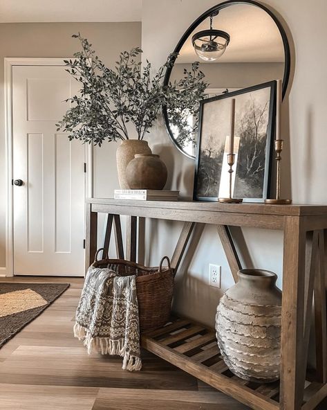 24+ Creative Fall Entryway Decor Inspirations (& Tips) - DrExplains Round Console Tables, Stairway Table Decor, Brown Entry Table Decor, Jungle Entryway, Entryway Lamps Foyer Tables, Mirror Hallway Entrance, Entryway Ideas Shoes, Front Door Table Decor, Cozy Entryway Ideas