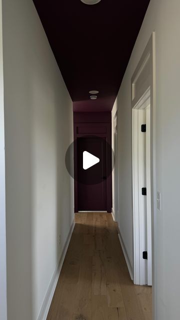 Max Barry on Instagram: "TikTok saw it first 👀😍  Color: Purple Basil by @ppgpaints   I learned this cool effect recently where if you paint one wall and the connected ceiling it elongates and widens your space. This long and narrow hallway needed some character and I am SO happy with how the color turned out. 😍🙌  Now, we’re onto styling and here are my thoughts:   1. Add a runner rug  2. Add either one large piece of art with a picture light above or sconces on either side OR a gallery wall of different mirrors 🤔 3. Changing the recessed lights for mini flush mounts that have more style/taste to them and create a more pointed directional light scheme.  4. Possible wallpaper 👏   Let me know if you’d try this color! It was a risk, but well WORTH THE REWARD! 🎉  #interiordesign #paint # Narrow Hallway Mirror Ideas, Long Hallway Lighting Ideas, Long Narrow Hallway Paint Ideas, Dark Narrow Hallway Ideas Wall Colors, Hallway Pictures With Lights, Painting Long Hallways, Long Narrow Hallway Lights, Small Narrow Hallway Ideas, Narrow Hallway Lighting