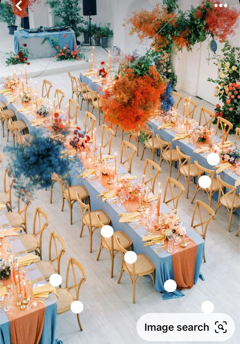 Orange And Blue Wedding Decorations, Blue And Orange Beach Wedding, Elemental Wedding Theme, Blue And Orange Event Decor, Dusty Blue And Orange Wedding Theme Table Settings, Light Orange And Blue Wedding, Sunset Boho Wedding, Wedding Blue Orange, Dusty Blue And Burnt Orange Wedding Color Schemes