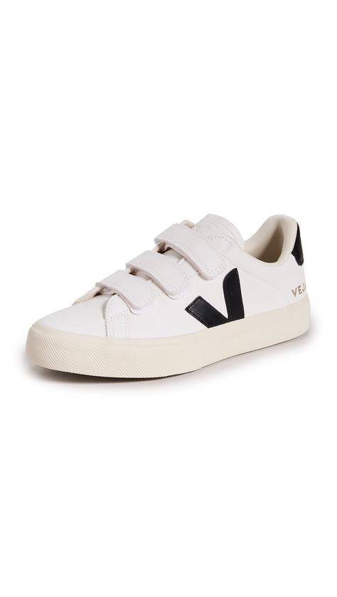 PRICES MAY VARY. Jersey lining is made from cotton and recycled polyester, Sole made of Amazon rubber, rice waste, and recycled rubber, ChromeFree leather, Designed on a unisex shoe last using European sizing, Removable cushioned insole Velcro closures Leather: Cowhide Made In Brazil Always a favorite label for go-anywhere shoes, Veja delivers again with these Recife sneakers. They're designed with Velcro closures for a touch of retro style, and feature high-contrast trim in black leather. Shoes Veja, Veja Shoes, Velcro Shoes, Work Sneakers, Velcro Sneakers, Veja Sneakers, Shoe Last, Black 13, Shoe Inspo