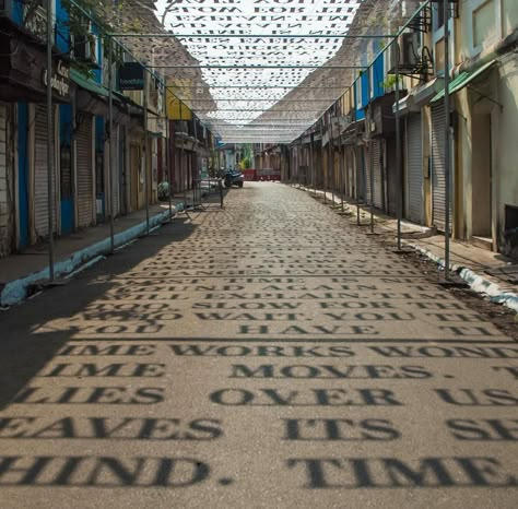 Sunlight Casts Shadows of Phrases Exploring Theories of Time in a Street Art Installation by DAKU | Colossal Led Installation, Street Installation, Colossal Art, Shadow Art, Art Installation, Land Art, Street Artists, On The Floor, Public Art