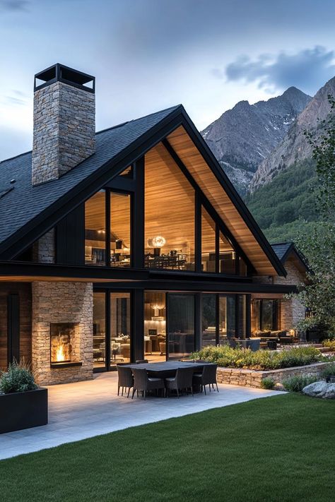 Modern mountain farmhouse with stone and glass facade. Embark on a whimsical journey through the rustic charms and untamed beauty of mountain farmhouses where heartwarming coziness meets high-altitude quirkiness. Modern Mountain Ranch Home, Luxury House In Mountains, Mountain Home With View, Timeless Lake House Exterior, Utah Mountain Home, Mountainside House Plans, Exterior Cabin Design, Unique Mountain Homes, House In The Mountains Interior