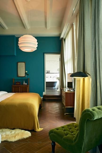 Yellow color shades, olive, mustard, lemon are modern trends in decorating home interiors Teal Bedroom Walls, Teal Bedroom, Teal Walls, Yellow Bedroom, Trendy Bedroom, Soho House, Design Del Prodotto, Green Chair, Bedroom Green