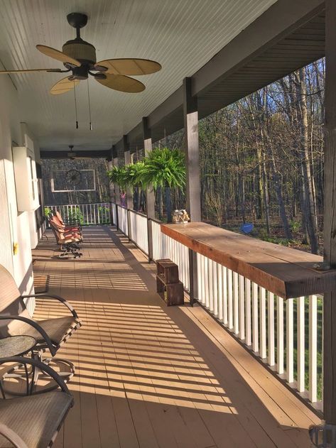 Wrap Around Porch With Screened Porch, Porch Railing Shelf, Dark Farmhouse Exterior Wrap Around Porch, Front Porch Ideas Cabin, Front Porch Bar, Industrial Porch Ideas, Screened In Wrap Around Porch, Wrap Around Porch Seating Ideas, Front Porch Wrap Around