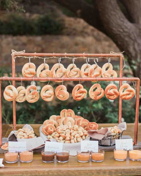 25 Cocktail Hour Ideas from Real Weddings | Martha Stewart Weddings - Assorted dipping sauces accompanied freshly-baked pretzels at this creative food station. #cocktailhour #weddinginspiration #weddingfood Reception Food Station, Wedding Reception Food Stations, Wedding Food Bars, Party Food Bars, Pretzel Bars, Wedding Food Stations, Graduation Party Foods, Wedding Food Ideas, Food Bars