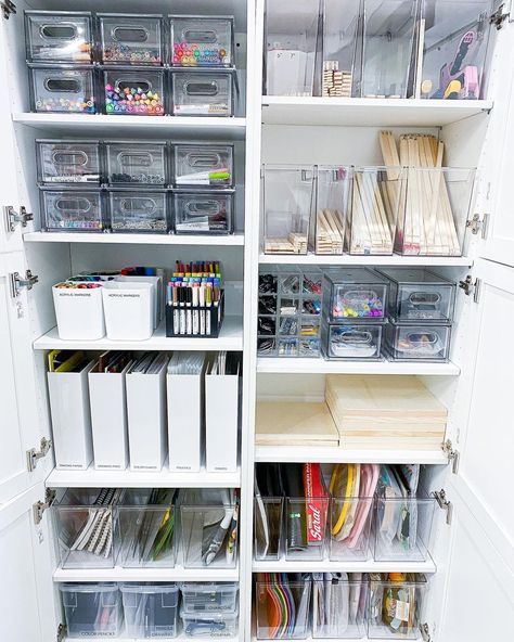 Consider using clear containers or labeled bins to easily identify contents. Storage solution from @tidybyco Work Office Organization Hacks, Office Supply Storage Ideas, Back Office Organization, Study Storage Ideas, Gift Organization Storage, Craft Cupboard Storage Ideas, School Craft Storage, Art Supplies Storage Shelves, Clear Storage Ideas