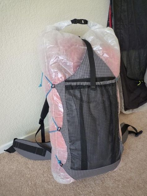 Well, inspired by Chris Zimmer's great packs, and with a lot of his help (especially with regards to creating nice shoulder straps), I built my first pack. Basically, I wanted... Backpack Modifications, Myog Backpack, Ultralight Camping Gear, Diy Backpack Pattern, Backpacking Backpack, Backpack Inspiration, Modular Backpack, Dry Bag Backpack, Sail Bag