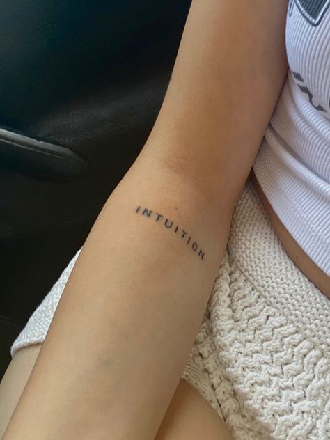 Mini Leg Tattoo, Word Tattoos For Women Arm, One Word Forearm Tattoos, Tattoos For Intuition, One Word Arm Tattoo, Tattoos About Intuition, 1 Word Tattoos For Women, Intuitive Tattoo Ideas, Worded Tattoos For Women