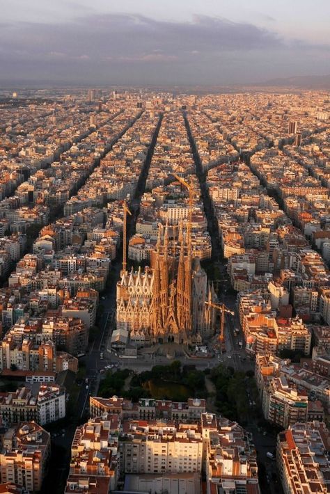 An aerial view of Barcelona, Spain. The The Eixample district has octagonal city blocks, designed to allow light and space on the street corners. Spain Photography, Barcelona City, Antoni Gaudi, Barcelona Travel, The Cathedral, Aerial Photography, Spain Travel, Barcelona Spain, Travel Inspo